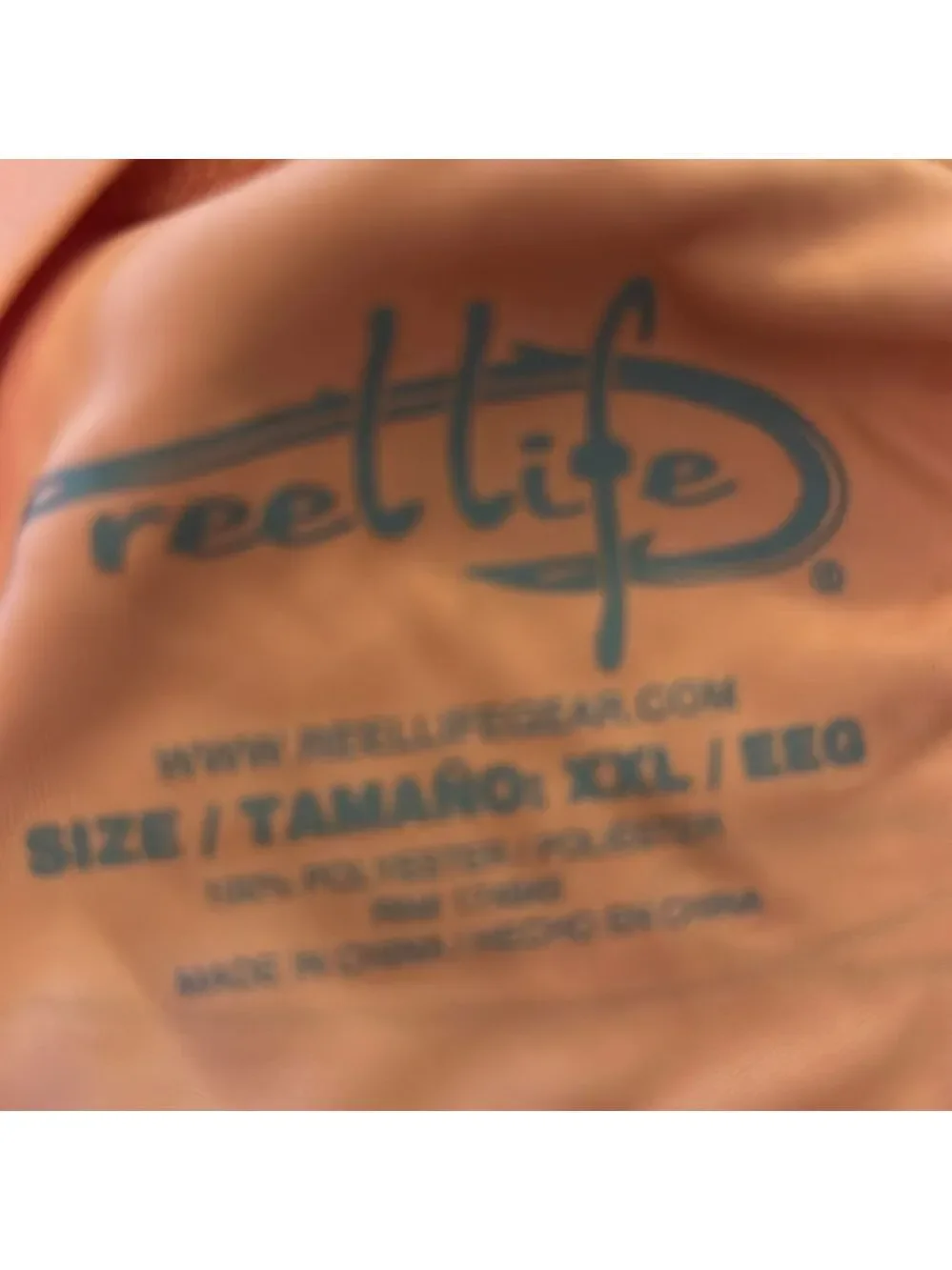 Reel Life XXL Orange Long Sleeve Shirt with a caught fish on back